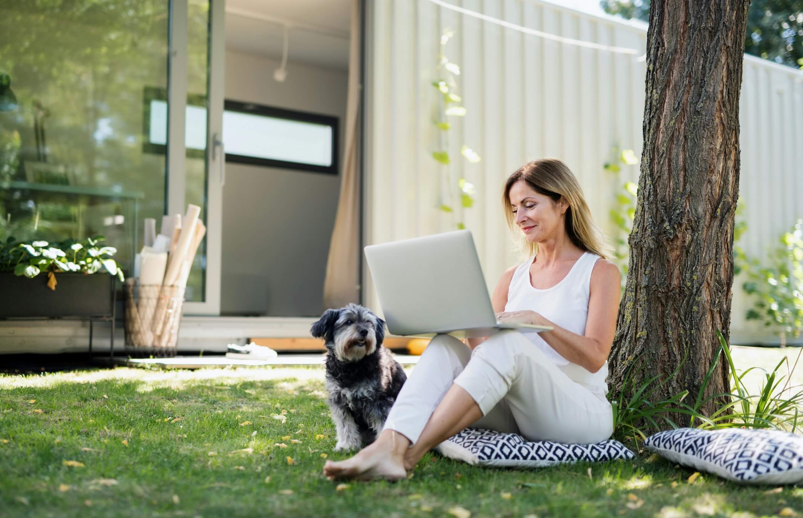 woman at garden with dog