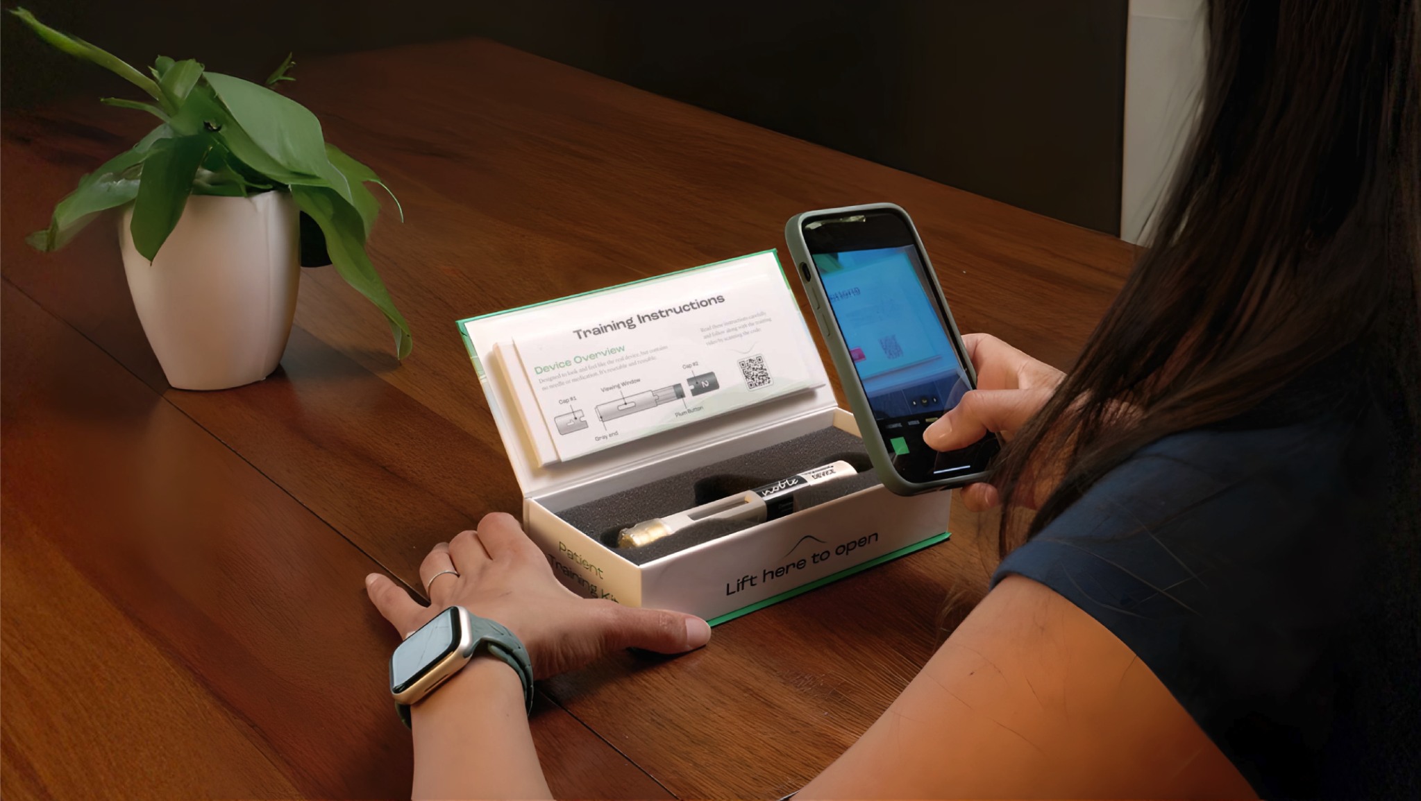 woman with training instructions on training device